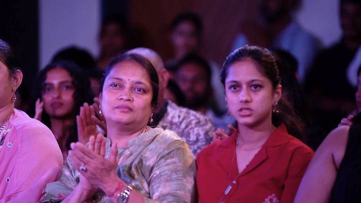 Audience members applaud during the grand finale.