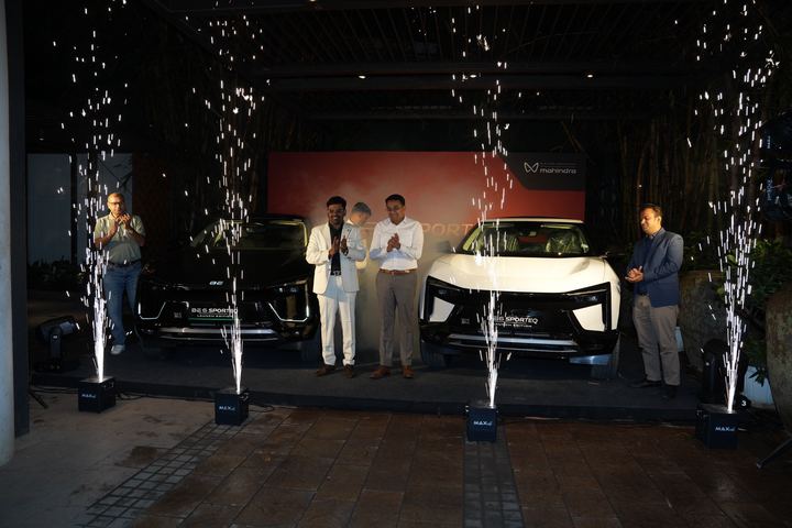 Sparkler fountains rise as the BE 6 is revealed on stage.