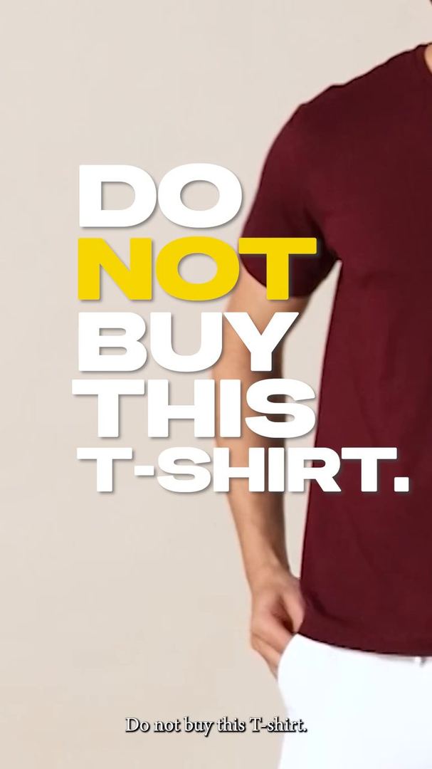 Bold type reads Do not buy this T-shirt beside a model in maroon.